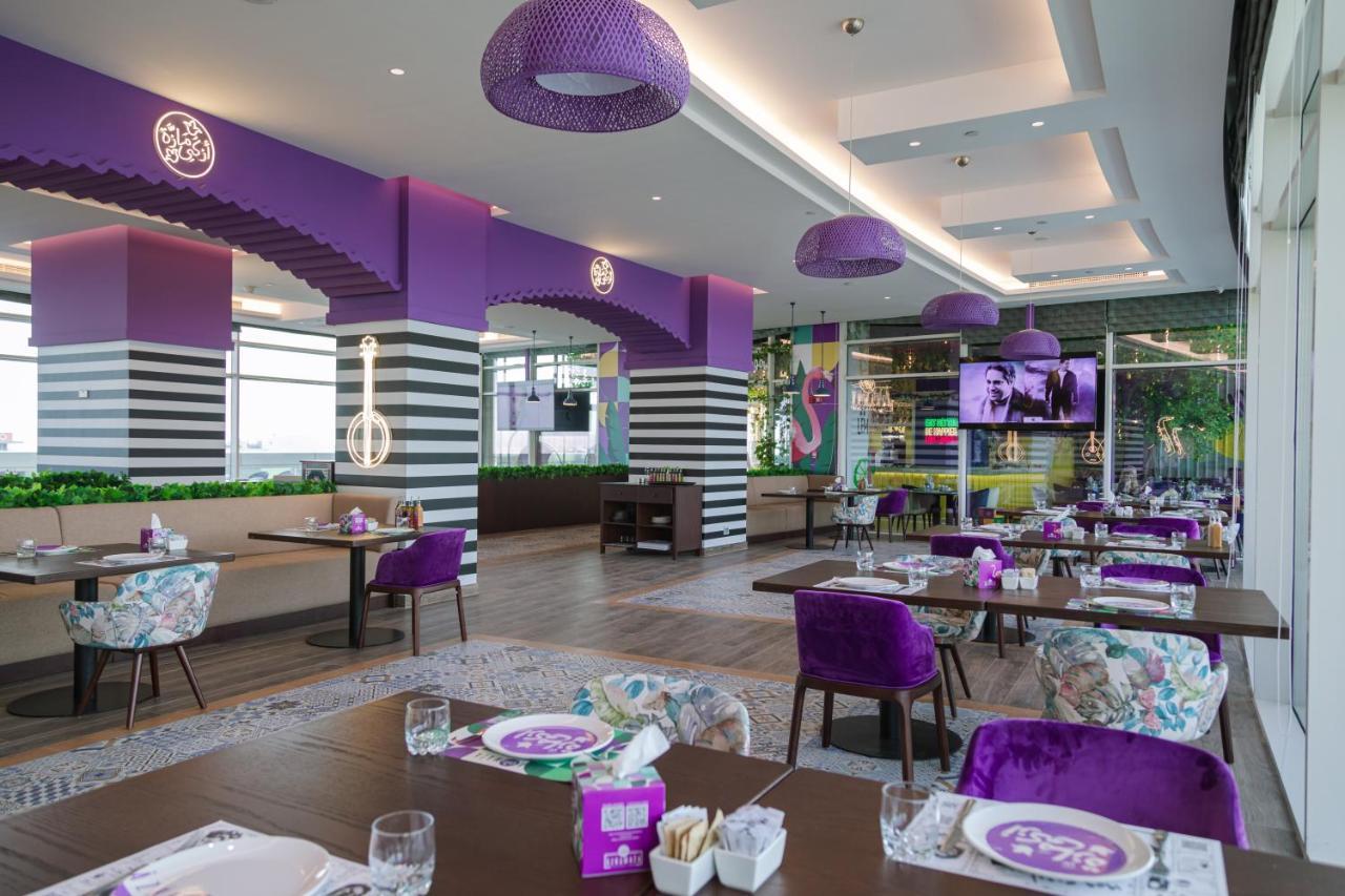 מלון Dusitd2 Salwa דוחה מראה חיצוני תמונה Interior of a Pizza Hut restaurant in Malaysia